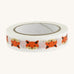 Paper tape with a fox design on a cream background.