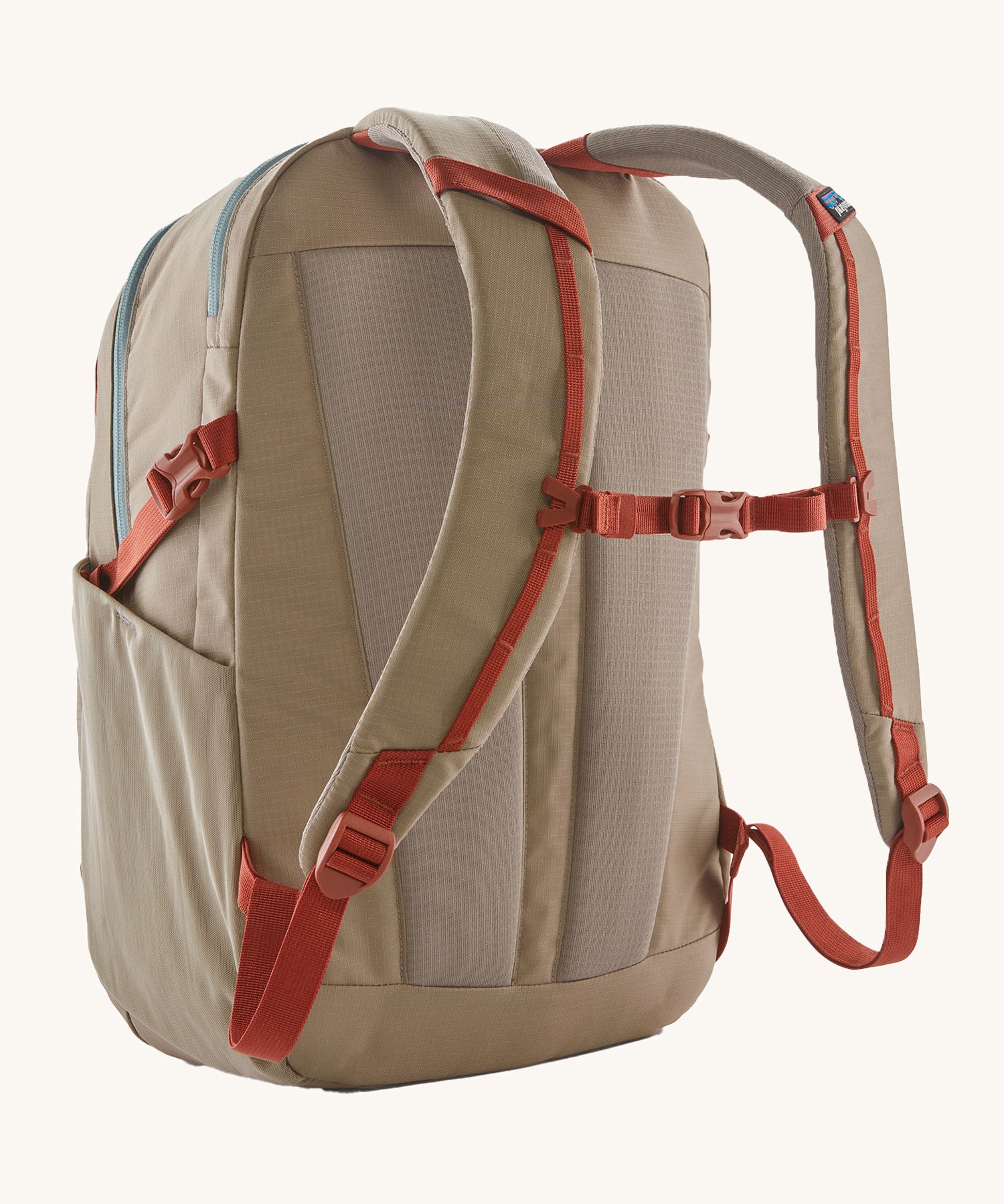 The back of the Patagonia Refugio Day Pack 26L Seabird Grey, showing the shoulder straps
