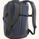 The back of the Patagonia Refugio Day Pack 26L  Smolder Blue, showing the shoulder straps