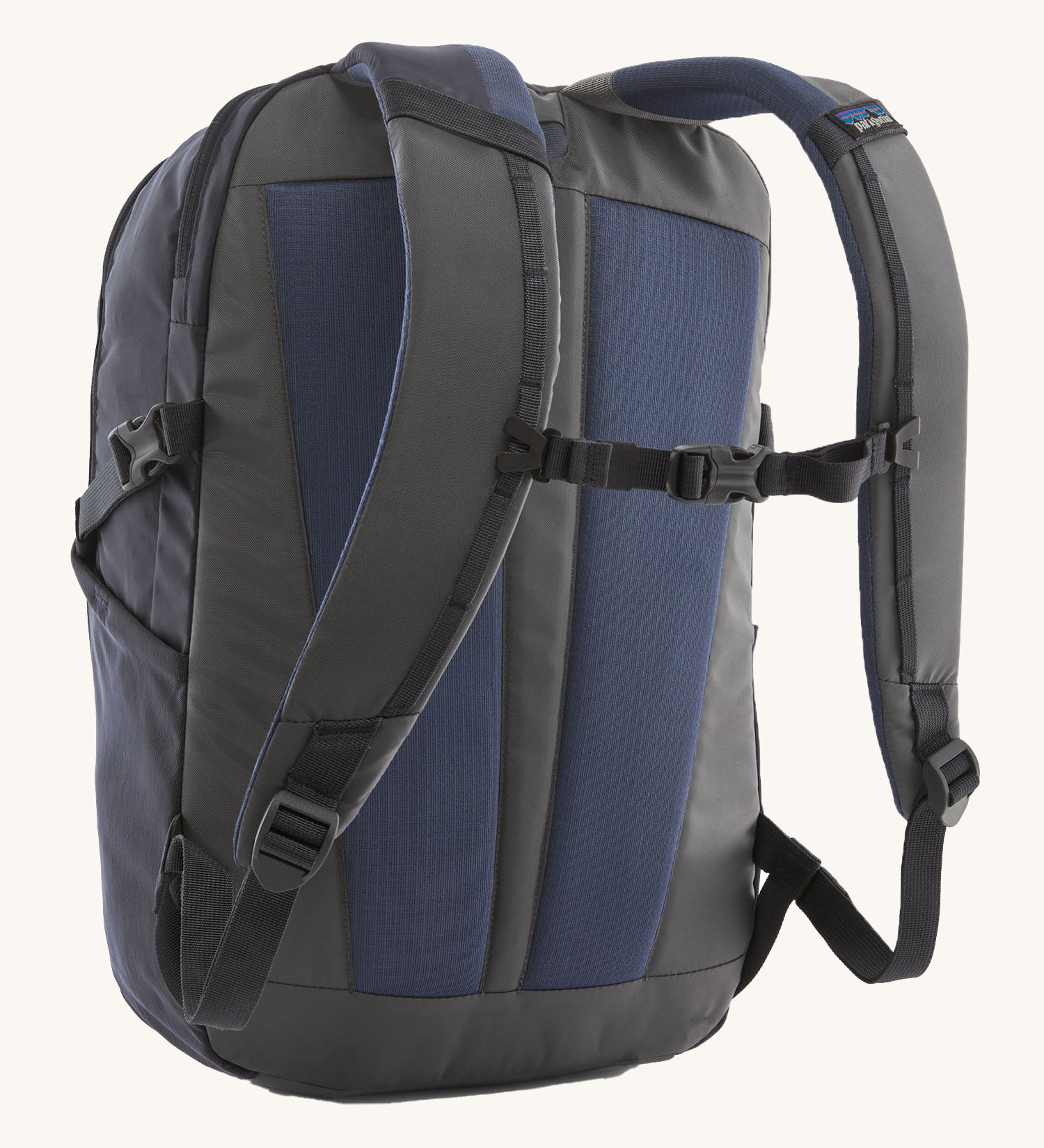 The back of the Patagonia Refugio Day Pack 26L  Smolder Blue, showing the shoulder straps