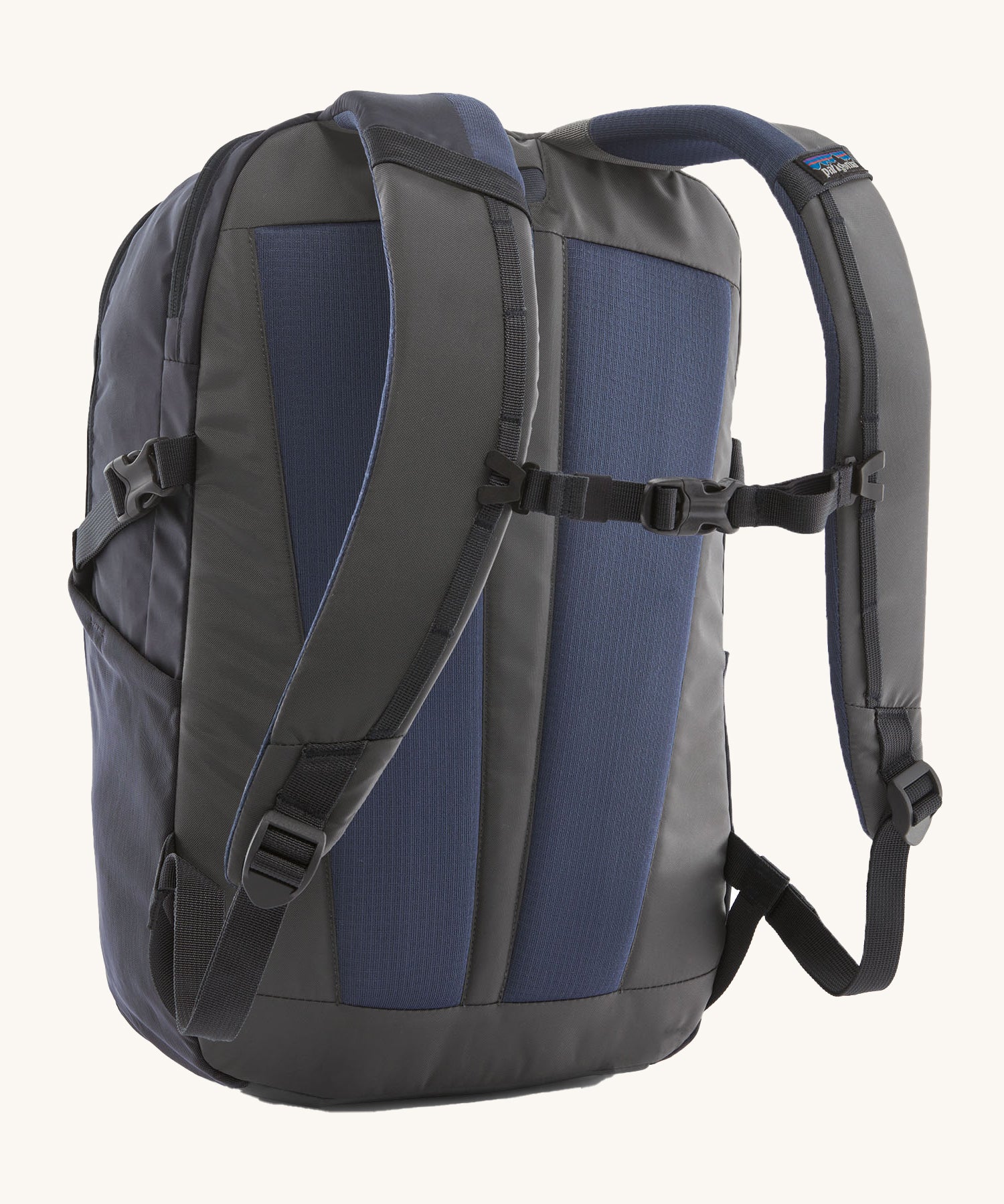 The back of the Patagonia Refugio Day Pack 26L  Smolder Blue, showing the shoulder straps