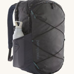 Patagonia Refugio Day Pack 30L  Smolder Blue showing a water bottle in the mesh side pocket