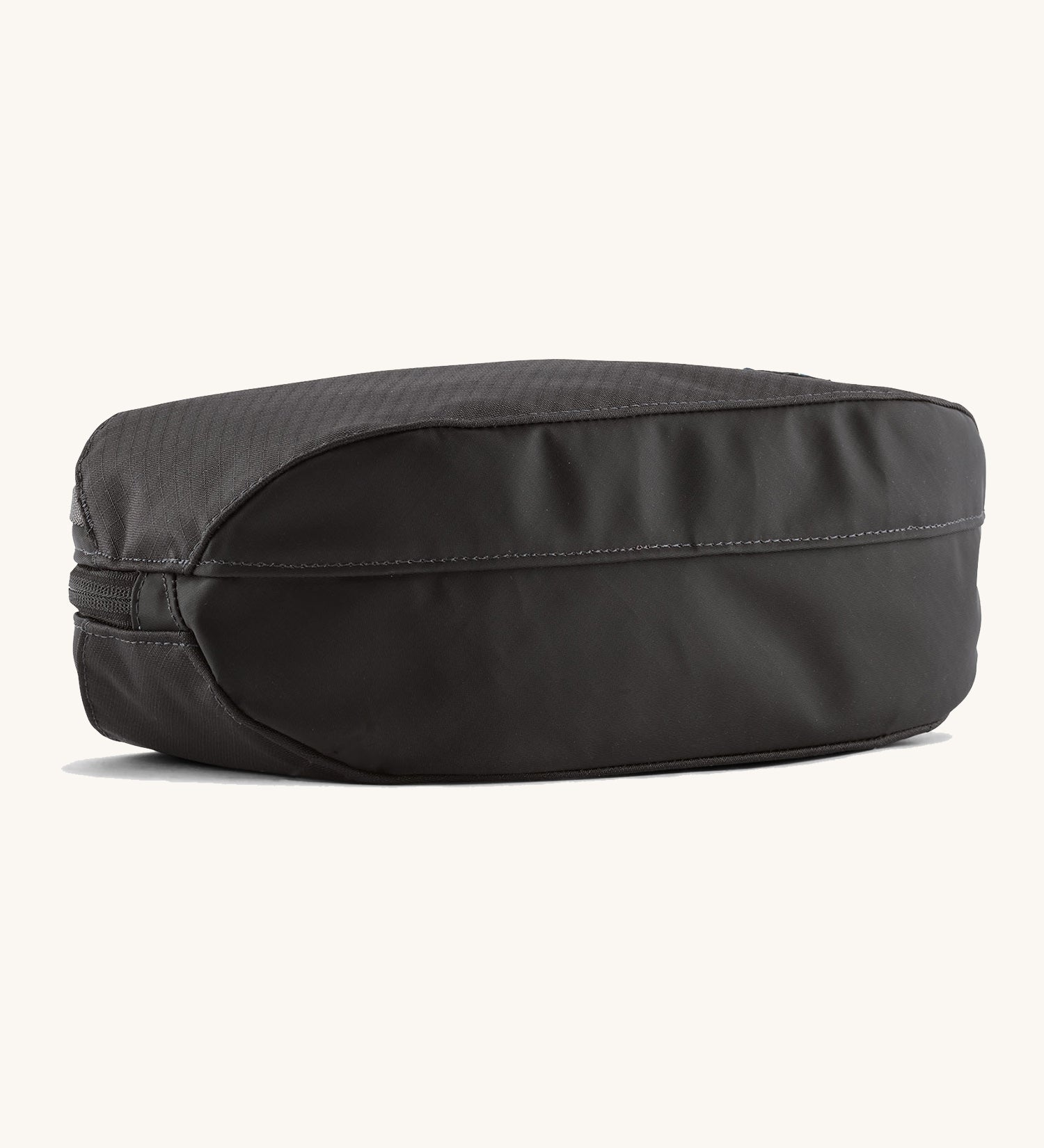 The bottom of the Patagonia Black Hole Cube 3L Black