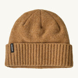 Patagonia adult brodeo beanie hat in talon gold available at Babipur. A soft knit style beanie with turn up brim and logo patch on the side