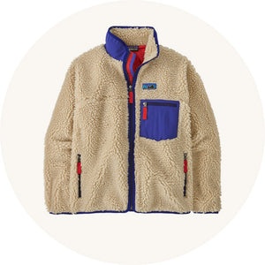 Patagonia Women's Classic Retro-X Jacket in Dark Natural with blue piping, zip and square front chest pocket to represent adult Patagonia clothing for sale at Babipur.