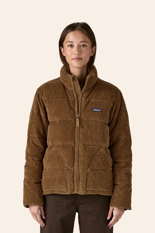 Woman wearing a Patagonia Puffer Cord Fjord Jacket without collar in Deer Brown to represent Patagonia Adults at Babipur, an official UK stockist.
