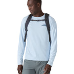 A person wearing the Patagonia Refugio Day Pack 30L  Smolder Blue