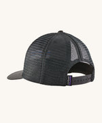 The back of the Patagonia P-6 Logo Trucker Hat - Forge Grey, showing the adjustable strap and mesh on the back of the hat