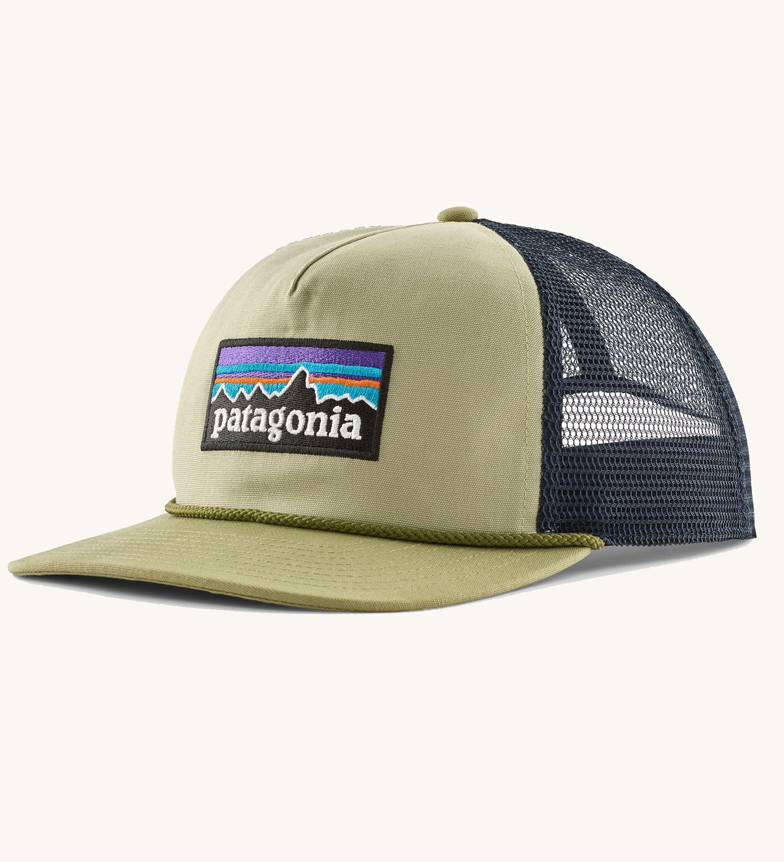 Patagonia airfarer cap in light green on the front and dark blue mesh back panel. Shows brand patch on front panel