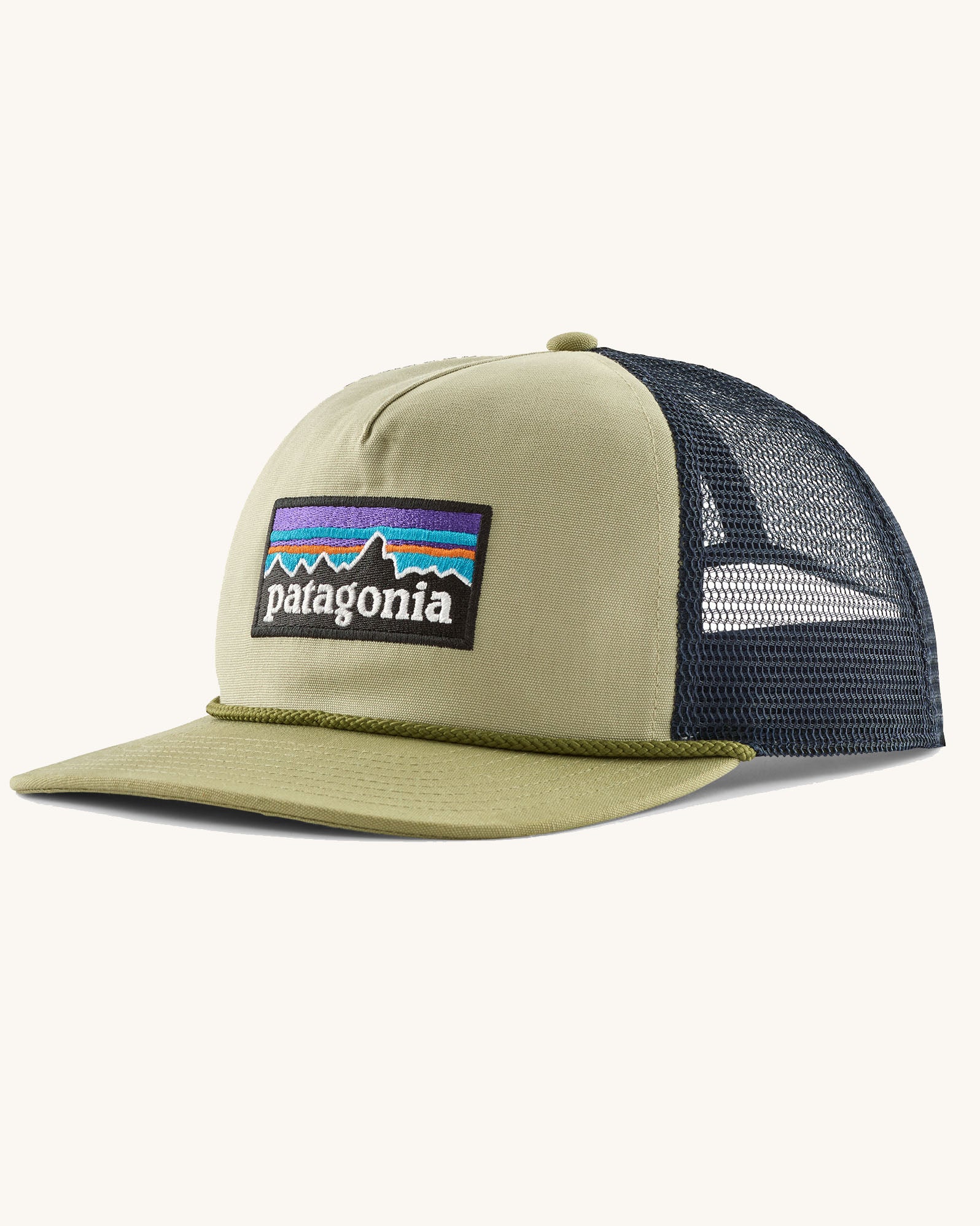 Patagonia airfarer cap in light green on the front and dark blue mesh back panel. Shows brand patch on front panel