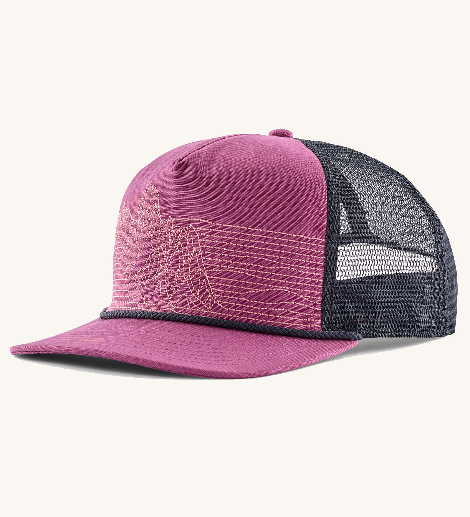 Patagonia airfarer cap in dark pink on the front and dark blue mesh back panel. Shows a stitched mountain design on the front 