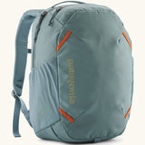 Patagonia atom 24 litre day pack in sage blue with matching shoulder straps zipped compartment and side pocket