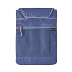 A close up of the laptop sleeve attachment for the Patagonia current blue atom day pack available at Babipur. Features a velcro fastener and a extra zip pocket on the front.