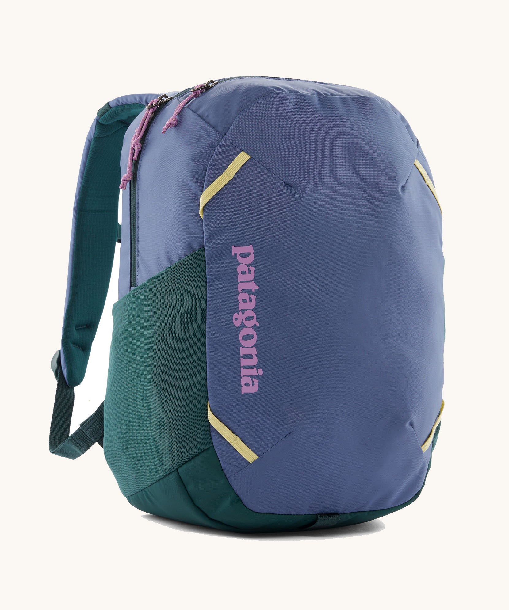 Patagonia atom 24 litres day pack in current blue. A 100% recycled material backpack in blue with dark green, pink and yellow detail. Features padded shoulder pads, mesh side pockets and 2 main compartments. 
