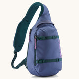Patagonia atom 8 litre sling bag in currentl blue. A 100% recycled material bag in blue with dark green detail. Features a padded shoulder strap. 2 main compartments and buckle fasteners to keep contents secure. 