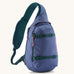 Patagonia atom 8 litre sling bag in currentl blue. A 100% recycled material bag in blue with dark green detail. Features a padded shoulder strap. 2 main compartments and buckle fasteners to keep contents secure. 