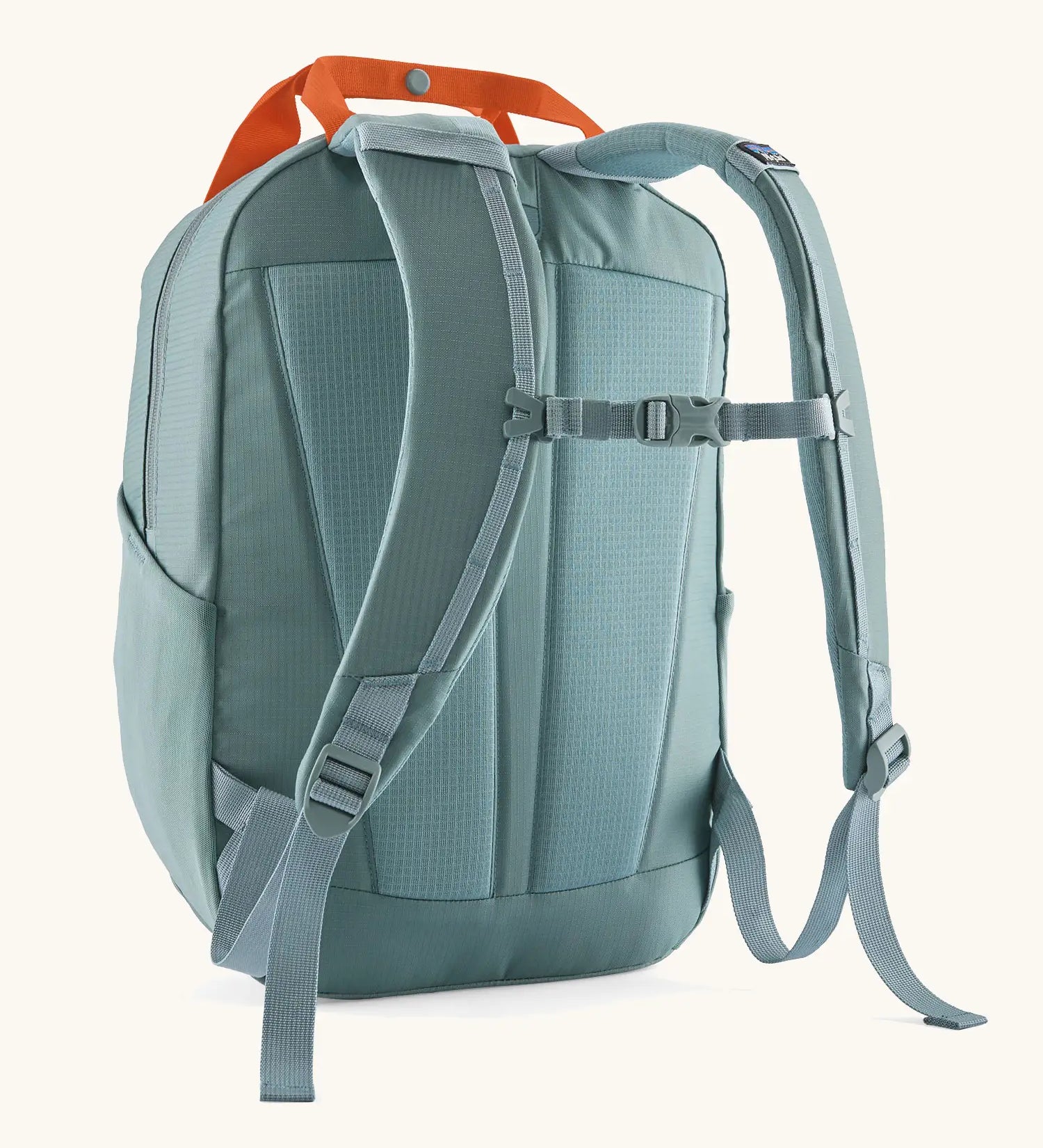 Patagonia atom 20 litre tote pack in sage blue with matching shoulders straps and quick release buckle