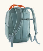 Patagonia atom 20 litre tote pack in sage blue with matching shoulders straps and quick release buckle