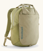 Patagonia atom 20 litre tote pack in light green with matching top handle, zipped compartment and side pocket