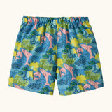 Back of Patagonia baby baggies quick drying shorts in blue with repeating tropical dolphin design.