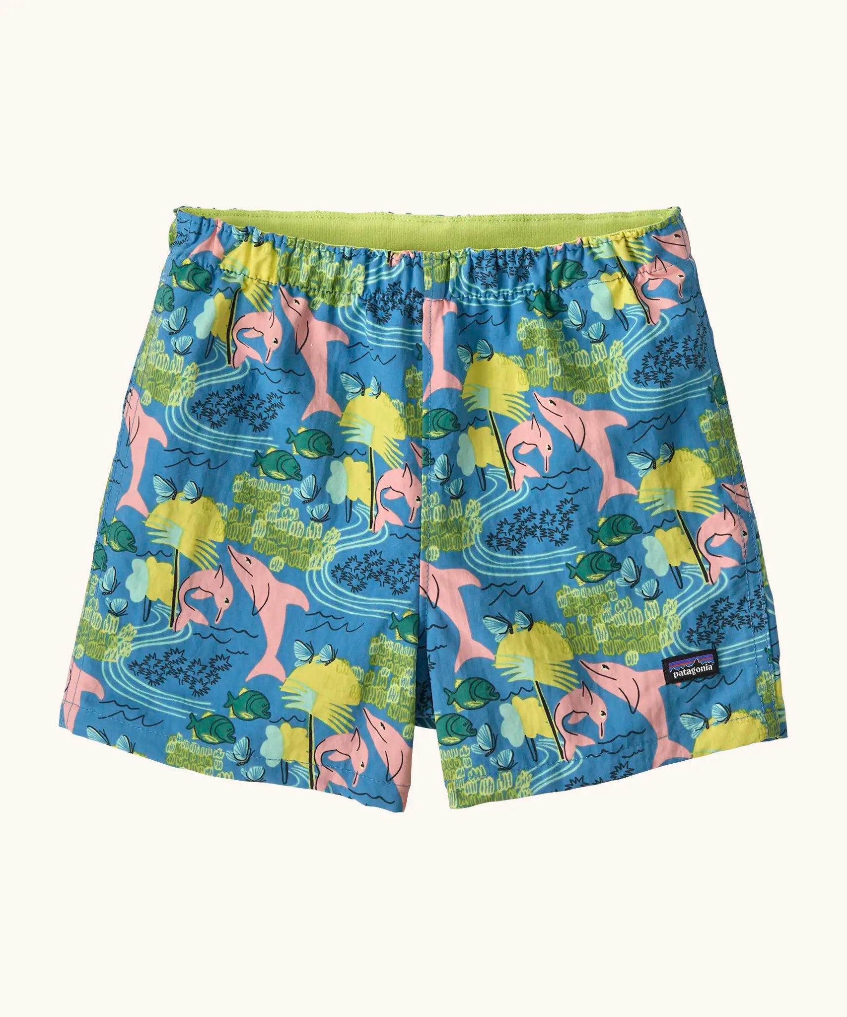 Patagonia baby baggies quick drying shorts in blue with repeating tropical dolphin design. Shows elasticated waist band