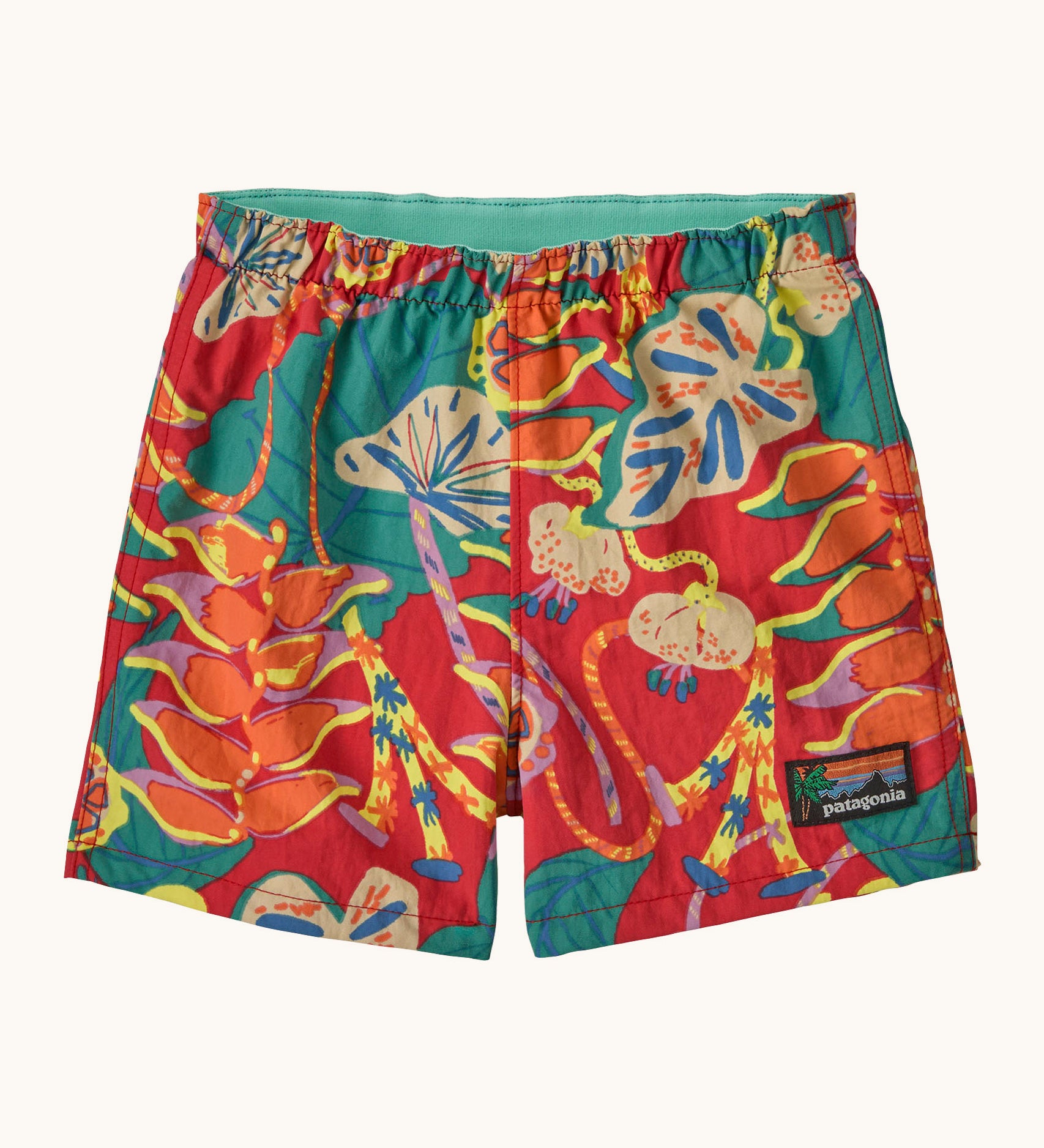 Patagonia baby baggies quick drying shorts in red with repeating abstract floral design. Shows elasticated waist band