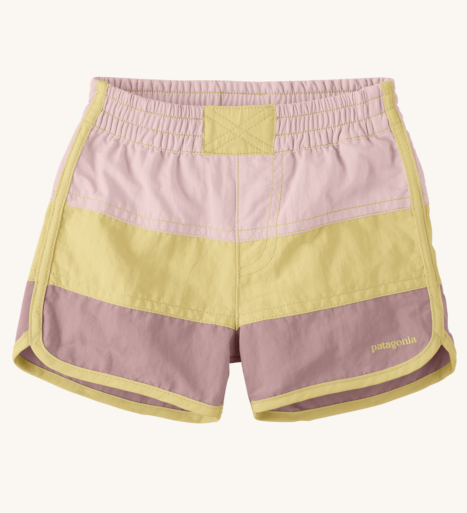 Patagonia's baby quick drying boardshorts in a pink and yellow stripe design. Shows elastic waistband 