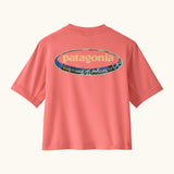Patagonia's little kids capeline short sleeve t-shirt in bright pink with large oval logo graphic on upper back 