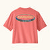 Patagonia's little kids capeline short sleeve t-shirt in bright pink with large oval logo graphic on upper back 