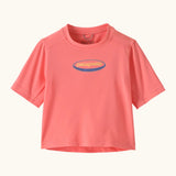 Patagonia's little kids capeline short sleeve t-shirt in bright pink with small oval logo graphic on upper body 