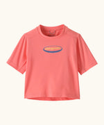 Patagonia's little kids capeline short sleeve t-shirt in bright pink with small oval logo graphic on upper body 