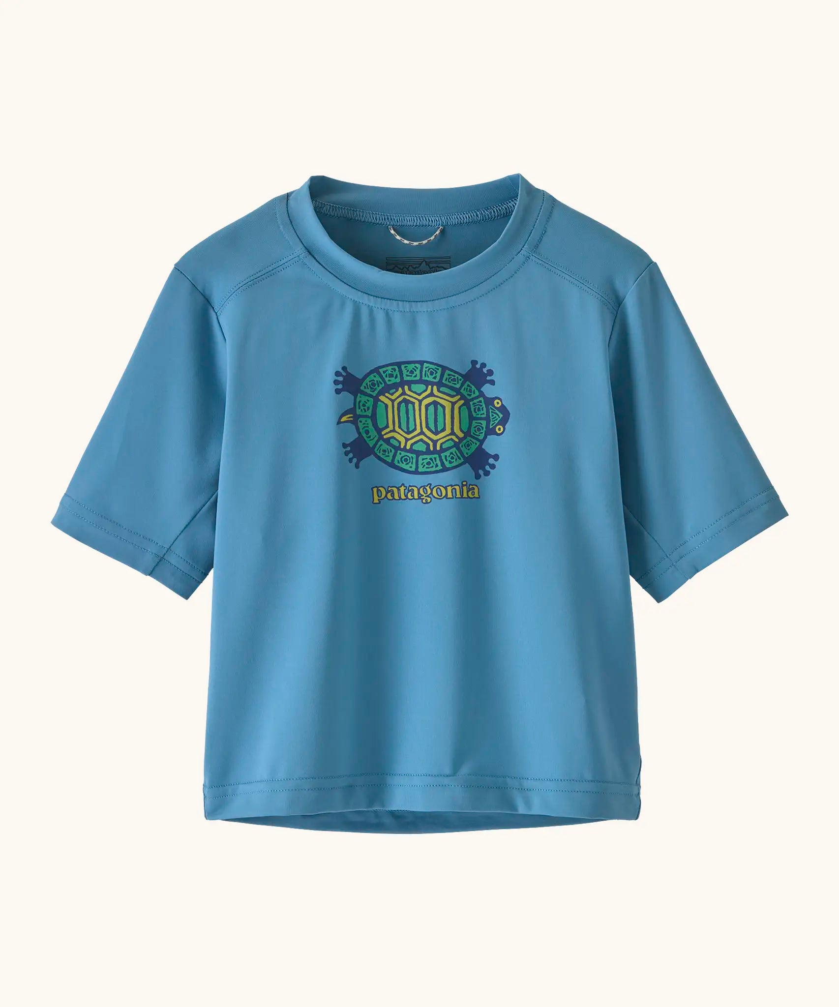 Patagonia's little kids capeline short sleeve t-shirt in blue with a funky turtle graphic on upper body