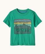 Patagonia little kids fitz roy skies short sleeve organic cotton t-shirt in green with large brand graphic on the front