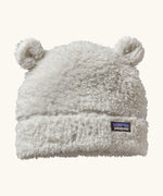 Patagonia Baby Furry Friends Hat in birch white. Cream High pile fleece hat with little bear-cub ear panels