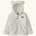 Patagonia Baby Furry Friends Hoody in birch white. Cream Fluffy hooded fleece with a full zip and pockets. Bear cub ears on the hood. Patagonia logo patch stitched on the front.
