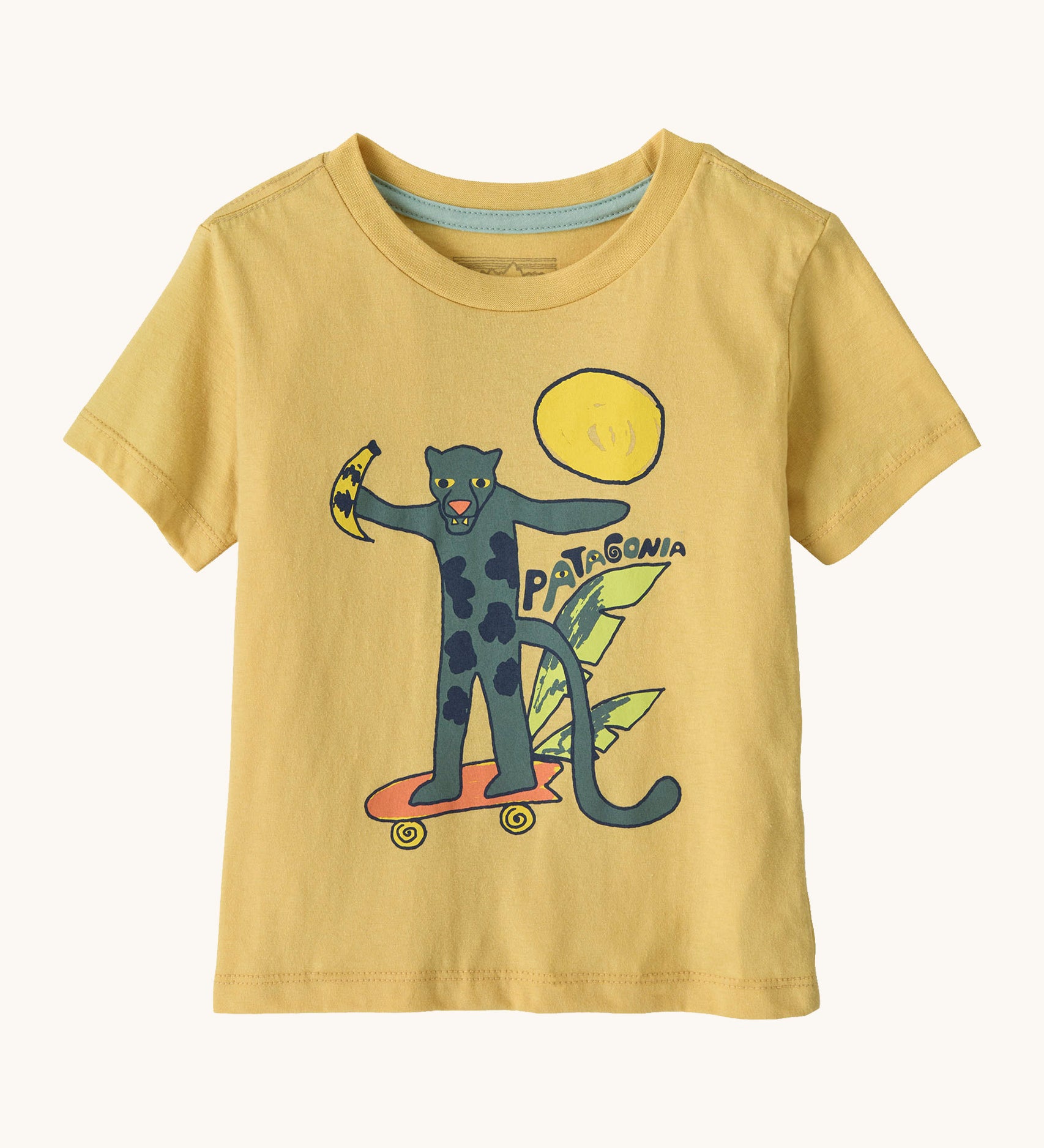 Patagonia organic cotton baby graphic t-shirt in yellow with a skating jaguar print on the front in a drawing style