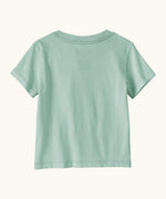Back of Patagonia's little kids capeline short sleeve t-shirt in mint green. T-shirt has a relaxed fit