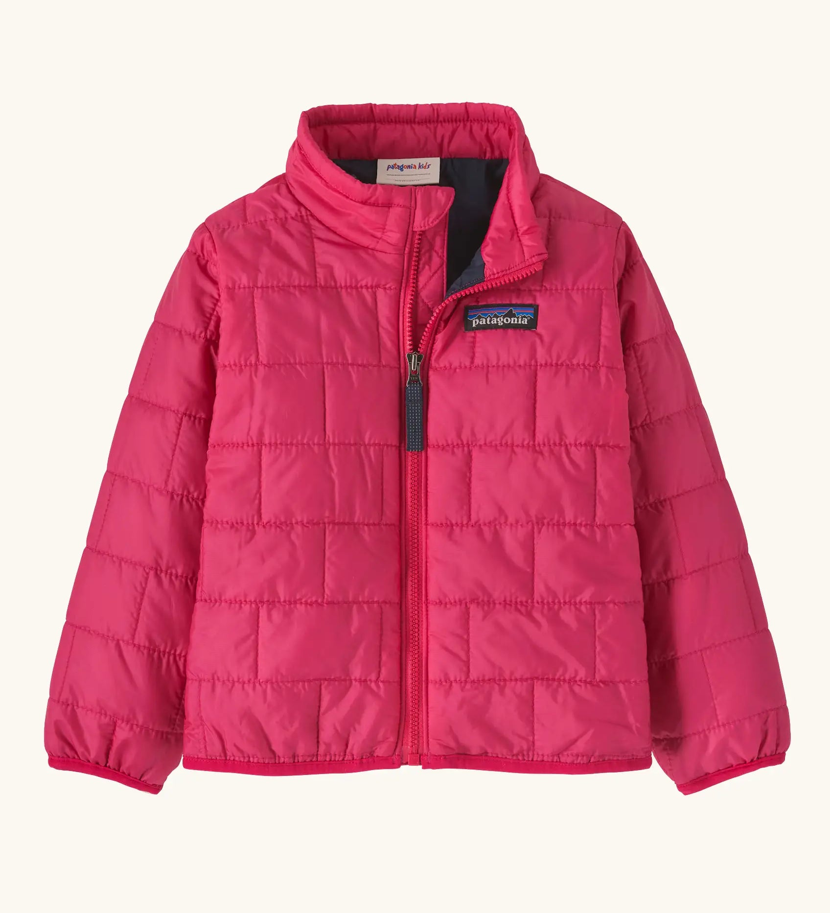 Patagonia water resistant baby nano puff jacket in punchy pink. Features a full front zip and brick puffer pattern