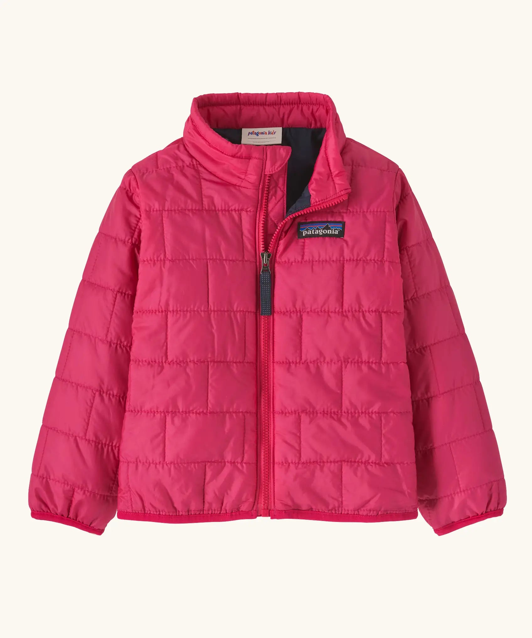Patagonia water resistant baby nano puff jacket in punchy pink. Features a full front zip and brick puffer pattern