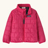 Patagonia water resistant baby nano puff jacket in punchy pink. Features a full front zip and brick puffer pattern