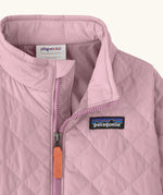 Close up of Patagonia's Little Kids Nano Puff Jacket  in pale purple showing front zip detail and collar