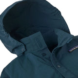 Close up of Patagonia's little kids recycled nylon outdoor everyday jacket in navy showing attached hood to collar