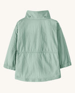 Back of Patagonia little kids recycled nylon outdoor everyday jacket in mint green. Shows removed hood and popper fasteners on collar