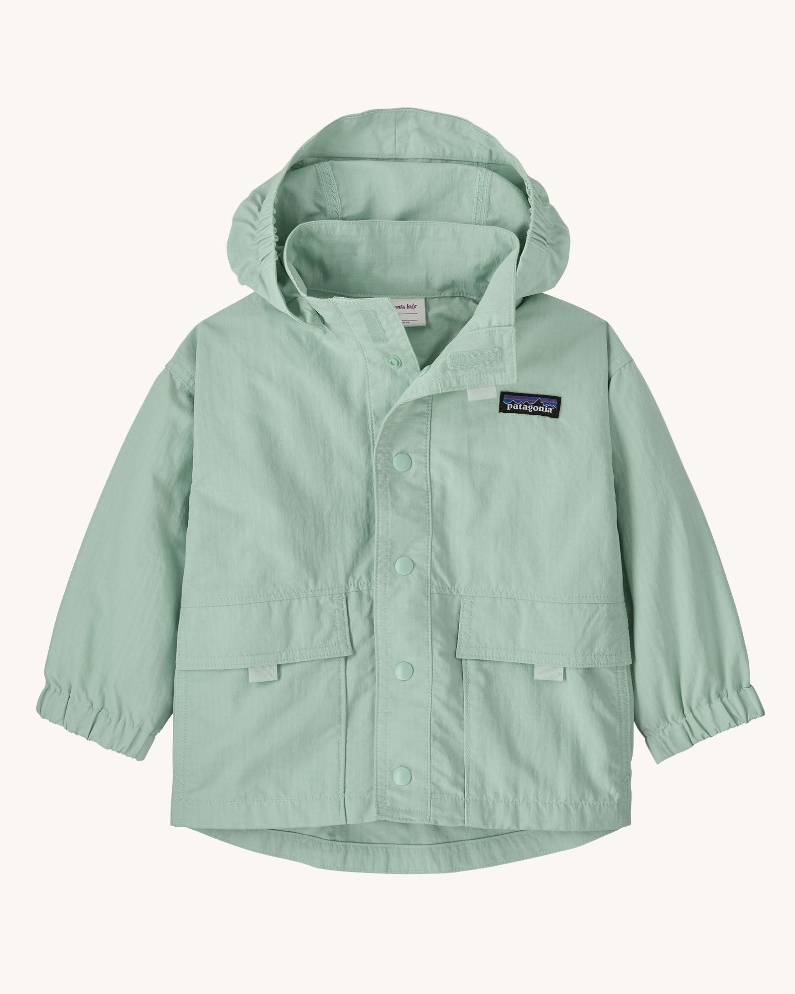 Patagonia little kids recycled nylon outdoor everyday jacket in mint green. Shows full length front popper, front velcro pockets