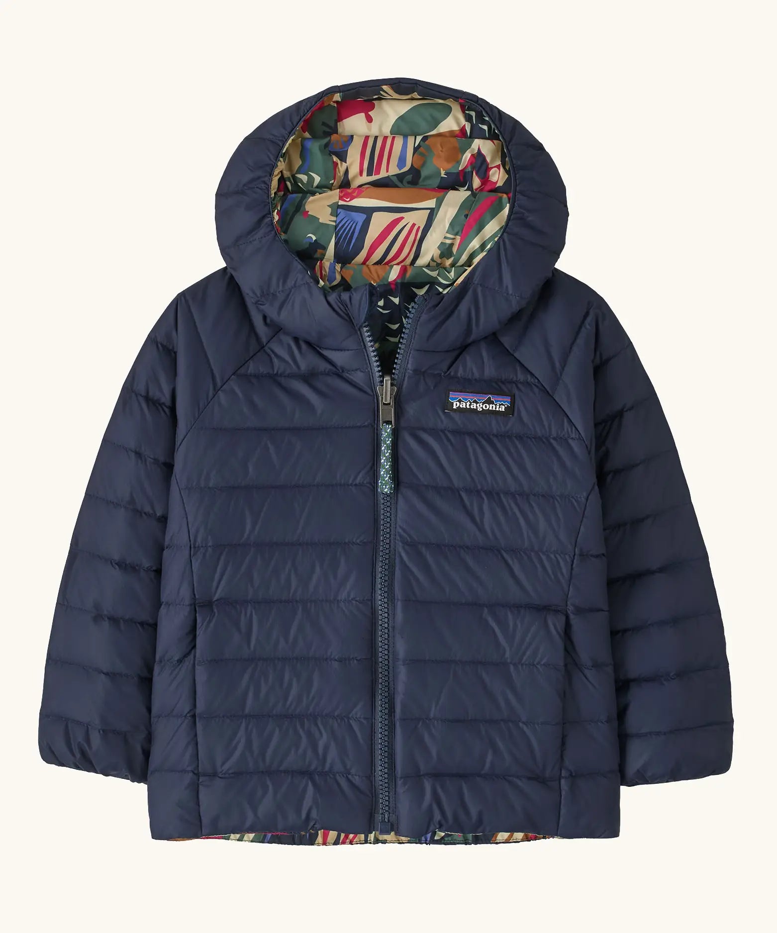 Patagonia baby reversible down hooded sweater water repellent jacket in new navy showing a full front fastener and side pockets