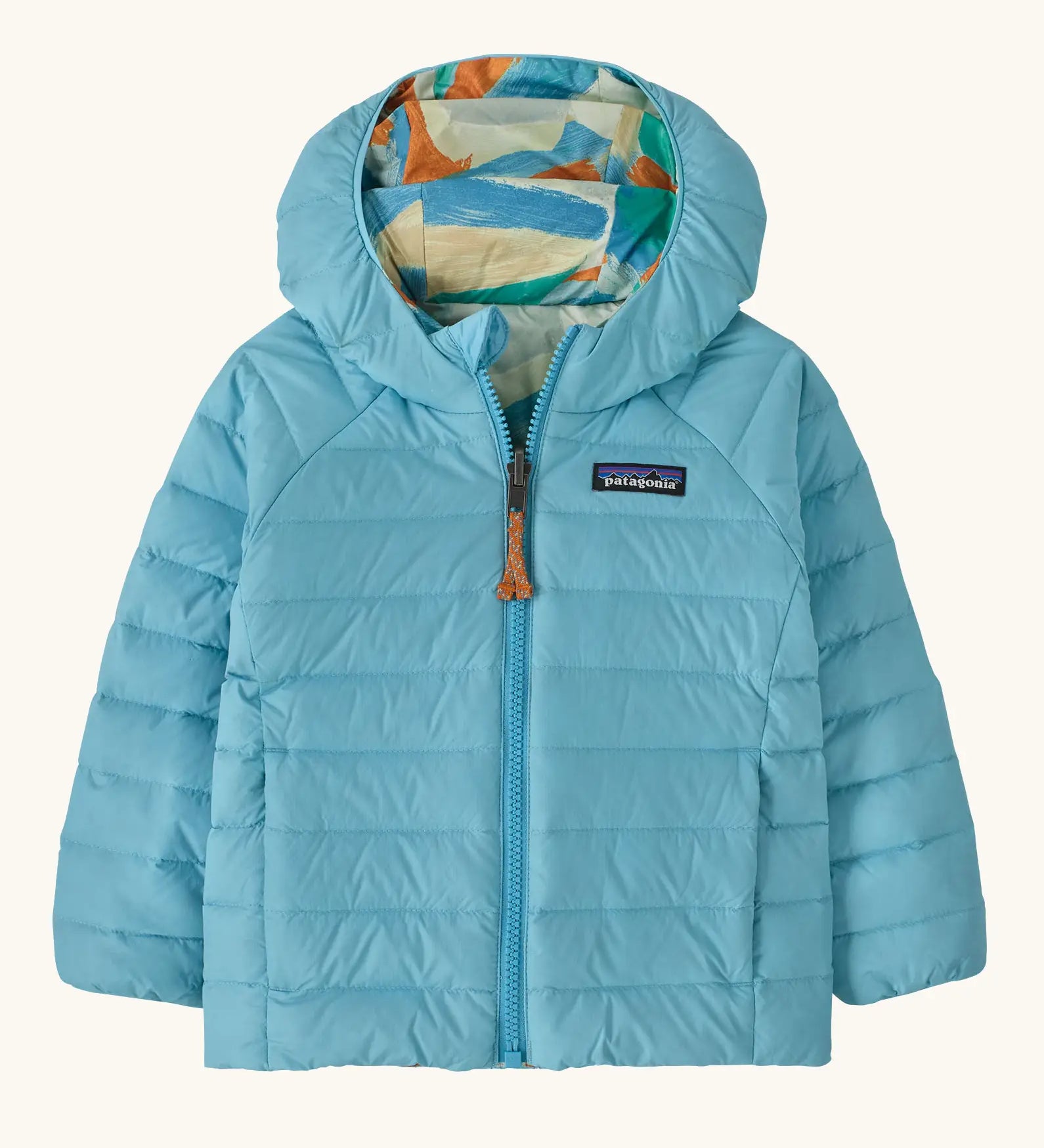 Patagonia baby reversible down hooded sweater jacket in bright blue showing  a full front zip and side pockets