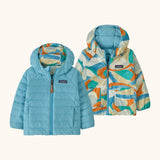 Patagonia baby reversible down hooded sweater jacket in bright blue with a abstract brushstroke design on the reverse. Features a full front zip and pockets