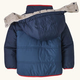 Back of Patagonia reversible little kids tribbles hoody in blue showing the popper fasteners on the removable hood