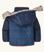 Back of Patagonia reversible little kids tribbles hoody in blue showing the popper fasteners on the removable hood