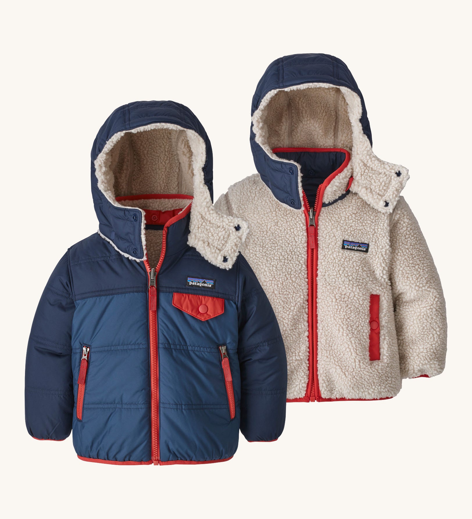 Patagonia reversible little kids tribbles hoody coat in blue with red trim and fleece reverse. Features a small chest pocket and side pockets